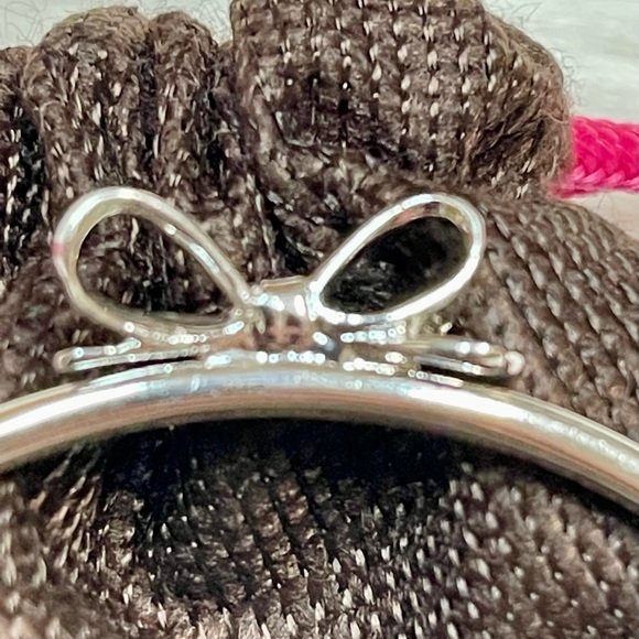 KATE ♠️ SPADE SILVER BOW PUSH BUTTON BANGLE NWOT - Picture 6 of 11
